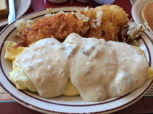 The Chicken Fried Steak Omelette. Oh, and there is bacon inside of that thing, too. Thank me.